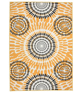Boho sunburst rug with warm earthy tones.